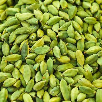 Fresh green cardamom pods close-up for export