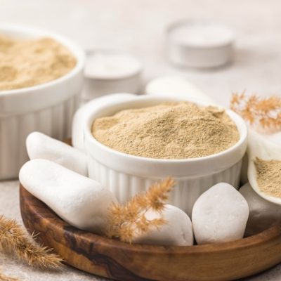 Processed Fuller's Earth (Multani Mitti) in white spa containers